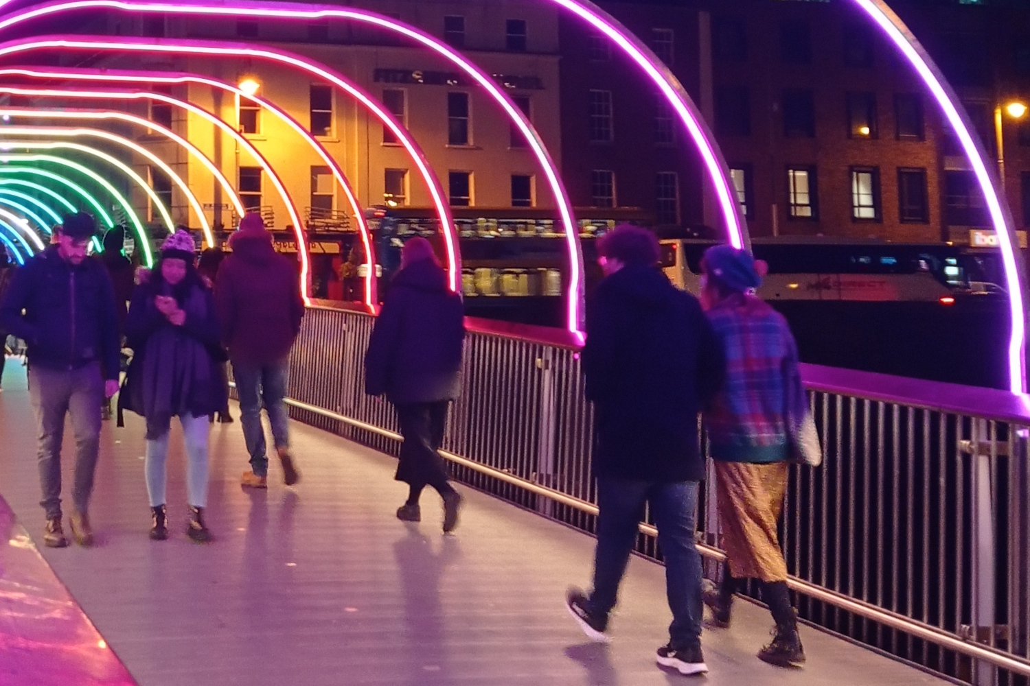 Dublin: The Ha'penny Bridge, on the River Liffey, at night